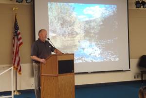 COSF President Jerry Westby introduces the speaker series and tonight's speaker Aly Covington.